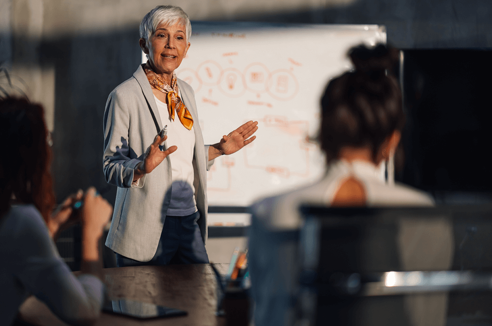 Woman speaking with hands raised