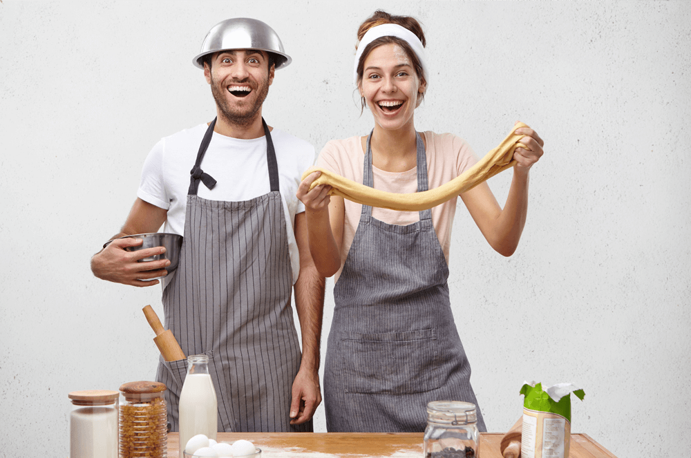 Man and woman cooking together