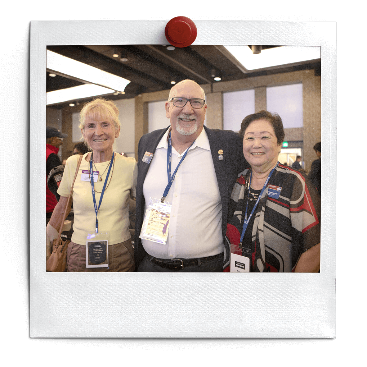 Past International Director Michael Osur with member Jan Vecchio (left) and Past International Director Gloria Shishido (right).