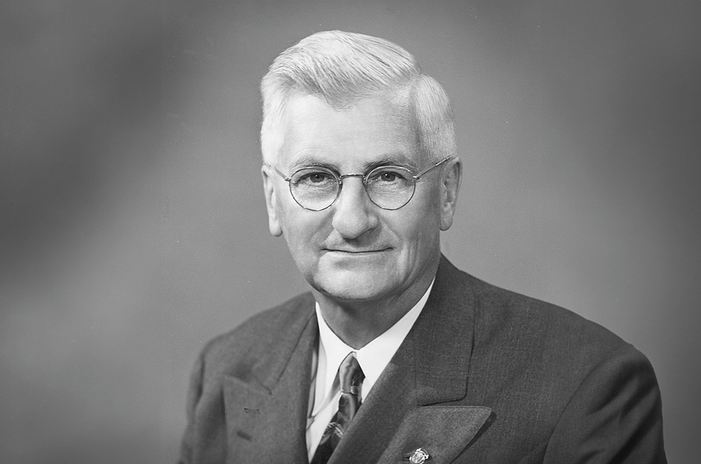 Dr. Ralph C. Smedley, man in suit