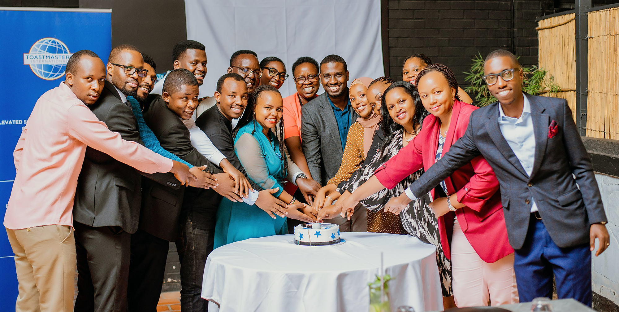 Members of Elevated Speakers Toastmasters Club in Kigali, Rwanda, celebrate the club’s charter in 2023. Within a year, the club achieved Select Distinguished Club status.