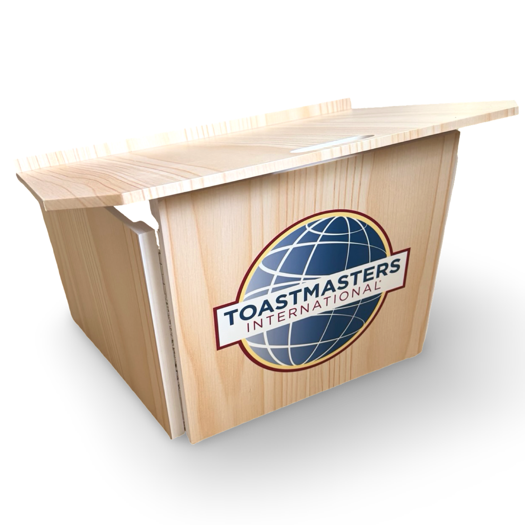 Portable Toastmasters lectern with light woodgrain looking finish and front-facing full-color Toastmasters International logo