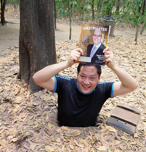 Matthew Lee, CC, ALB, from Hong Kong SAR,  China, stops halfway into the Cu Chi tunnels, Ho Chi  Minh City (Saigon), Vietnam.