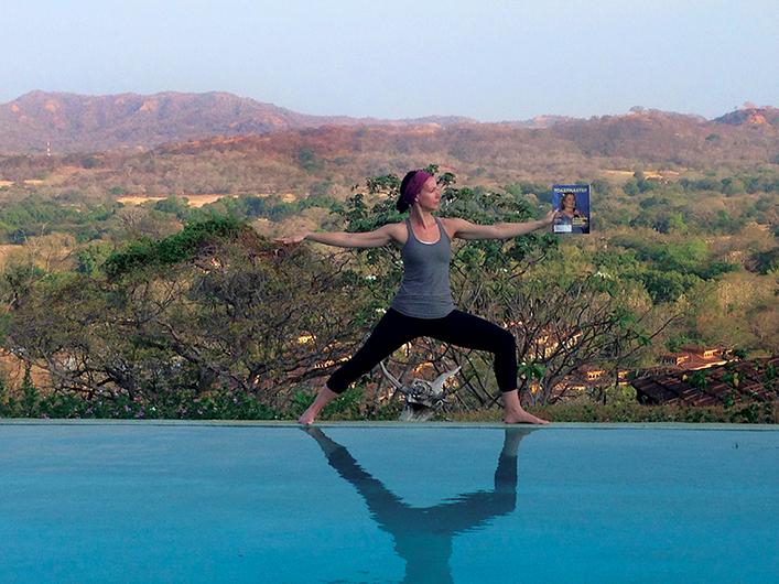 Annika Pint, from Toronto, Ontario, Canada, strikes a pose at Panacea del al Montana yoga retreat near Tamarindo, Costa Rica.