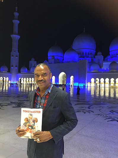 Stephen Ggiles, from Dallas, Texas, takes in the view at the Sheikh Zayed Grand Mosque in Abu Dhabi, United Arab Emirates.