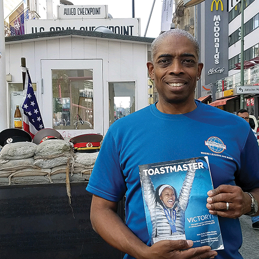 Mark Brown, ATM, CL, from Lizella, Georgia, visits Checkpoint Charlie, near the Berlin Wall in Berlin, Germany.