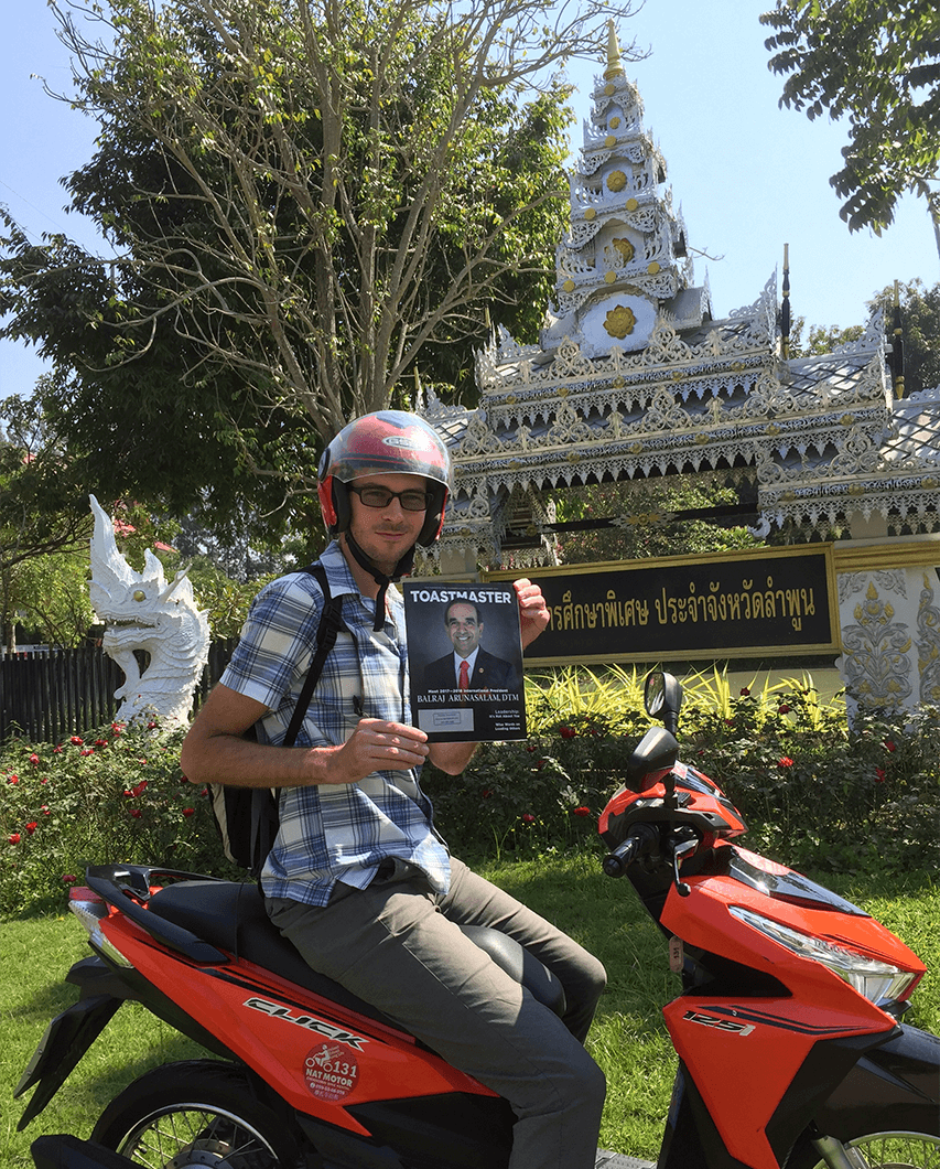 Michal Weyna, CC, ALB, of Doha, Qatar, takes a break from sightseeing at a shrine in Chiang Mai, Thailand.