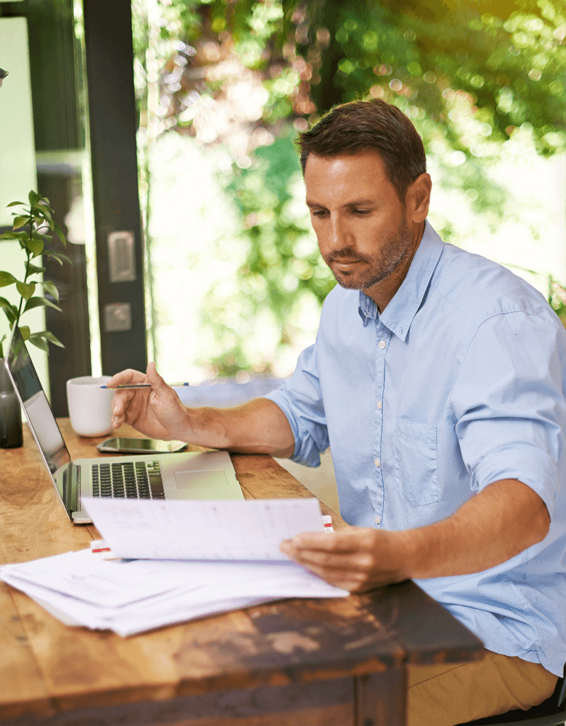 Man sitting at a table planning