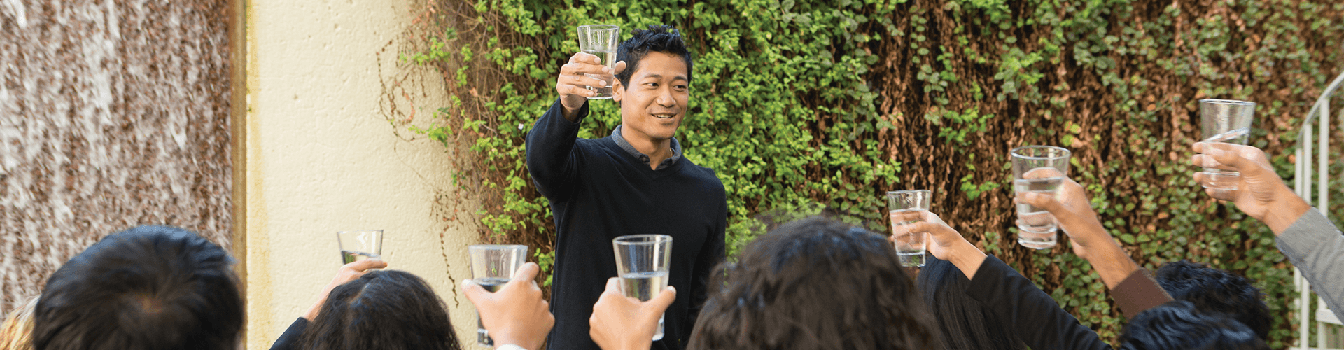 Man toasting a crowd