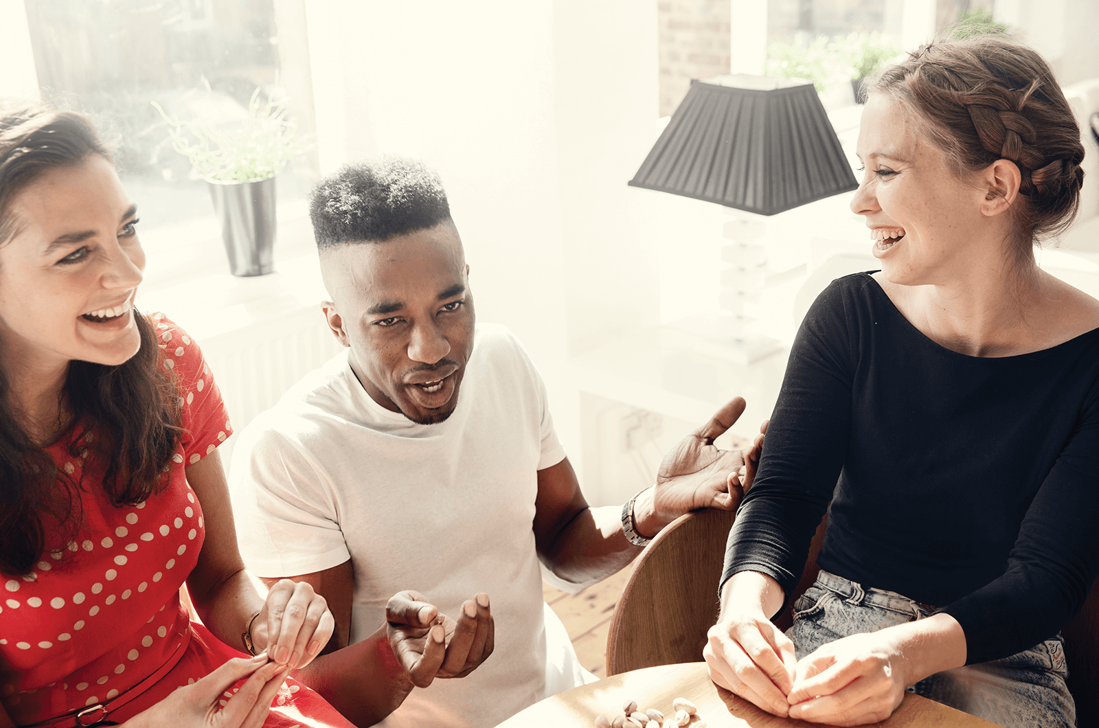 Three people laughing