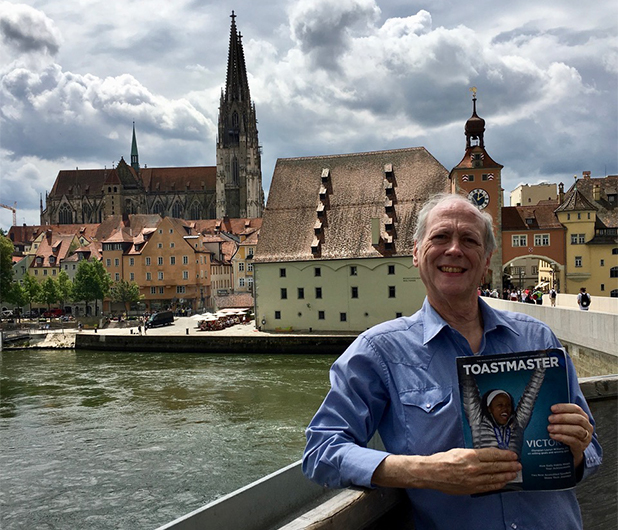 Bill Hensley, ACG, CL, from San Antonio, Texas, enjoys views of historic Burgweinting in Regensburg, Germany, while cruising the Danube River. 