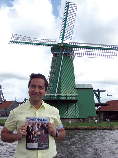 Manan Tiwary, from Dubai, United Arab Emirates, smiles brightly near a windmill at Zaanse Schans in the ­Netherlands.