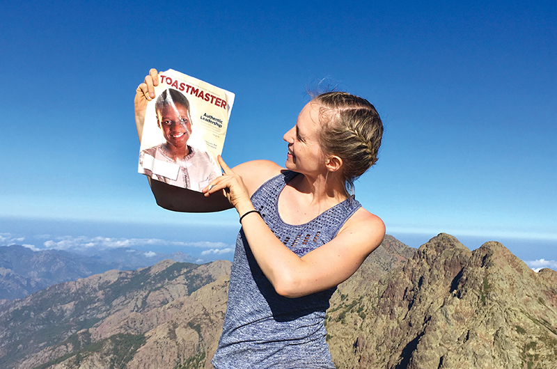 Sarah Johanna Dejaegher, CC, from  Brussels, Belgium, poses on the Col de Stagni waypoint on the GR 20 hiking trail in Corsica, a Mediterranean island off the coast of France. 