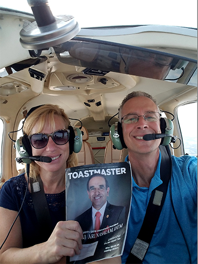 Rich Hamm and his wife, Becky, from South Bend, Indiana, pose for a picture as they fly to visit their daughter in Michigan. 