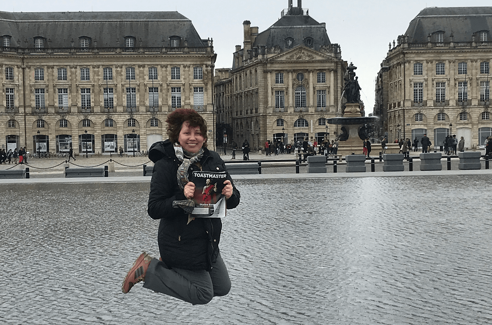 Elena Schwartz, of North Potomac, Maryland, jumps high in front of the Miroir d'eau (Water Mirror). The world's largest reflecting pool in Bordeaux, France, is just two centimeters deep.