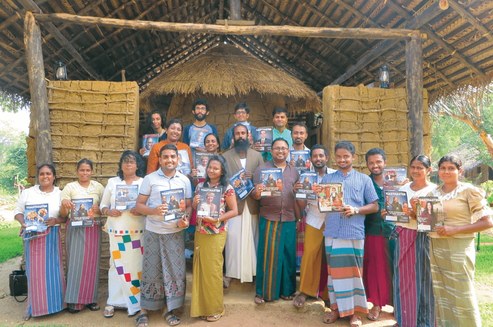 Toastmasters group pose in ancient village in Puranagama, Sri Lanka