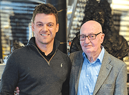 Robert Moores and Alan Thomas stand posing together