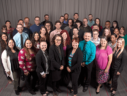Toastmasters International World Headquarters Member Support staff posing in group photo