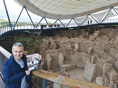 Umut Tarik Akdeniz of Ankara, Turkey, stands at the Göbekli Tepe, in the country’s Southeastern Anatolia Region. 