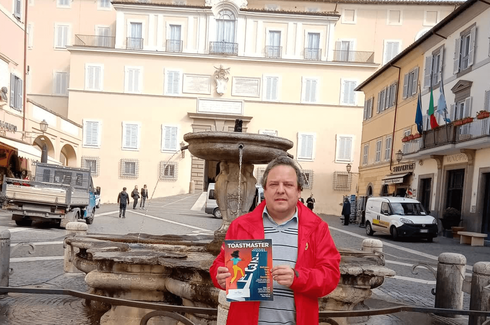 Ricardo Gama of Riachos, Portugal, pauses for a photo with the Apostolic Palace of Castel Gandolfo, Italy—the vacation retreat for the Catholic pope. 