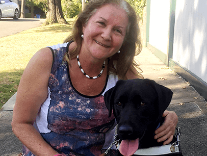 Blind woman with guide dog