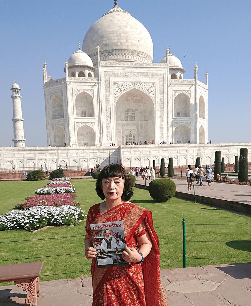 Keiko Miyake, DTM, of Shimonoseki, Japan, wears a sari to visit the Taj Mahal in Agra, India.