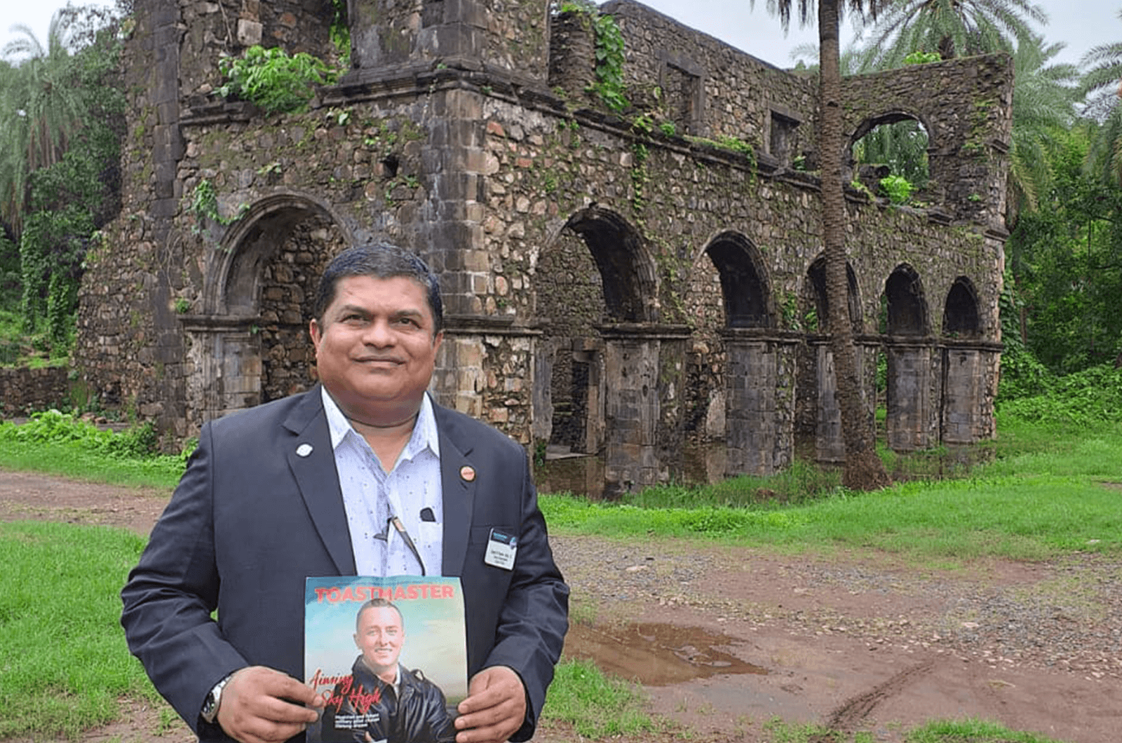 Ubedur Rehman Shaikh, of Jubail, Saudi Arabia, stands in front of Vasai Fort in Vasai, India, also known as Fort Bassein, and protected by the Archaeological Survey of India.