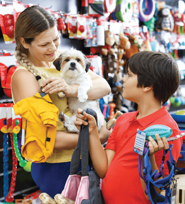 Kids with dog at pet store