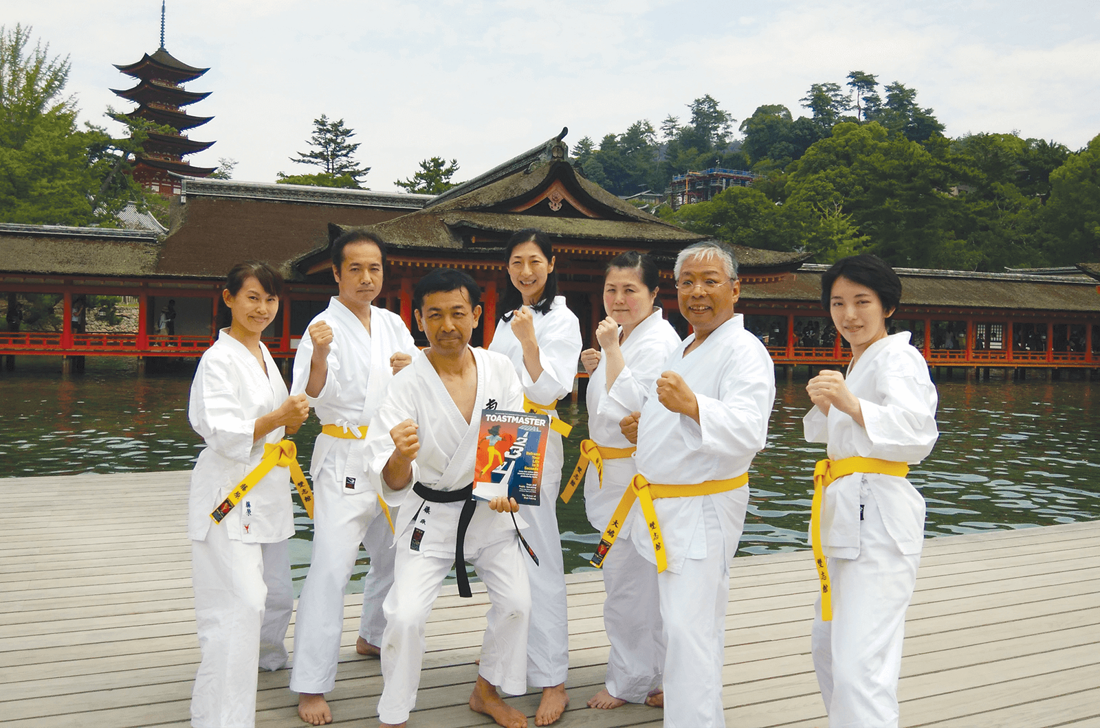 Club members pose in karate uniforms