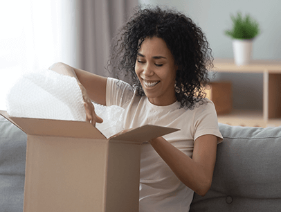 Woman opening box