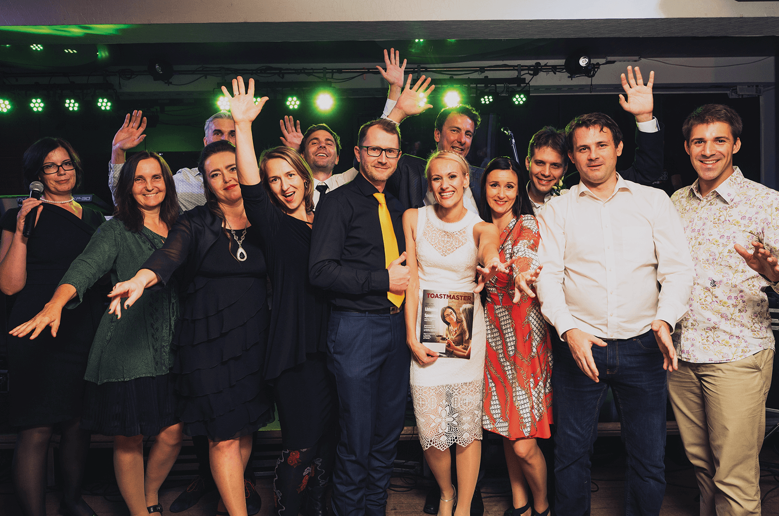 Group of Toastmasters members celebrating at a wedding