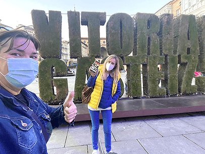 Cristina Juesas, DTM, (pictured left) and Marta Kernstock of Vitoria-Gasteiz, Basque Country, Spain, stop to show the online edition on Marta’s phone as they walk.