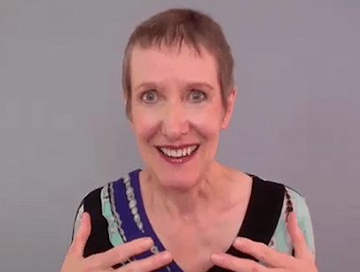 Woman speaking to camera during online speech