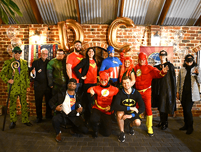 People dressed up in superhero costumes