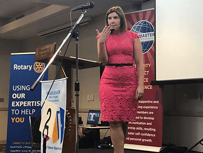 Woman in red dress onstage