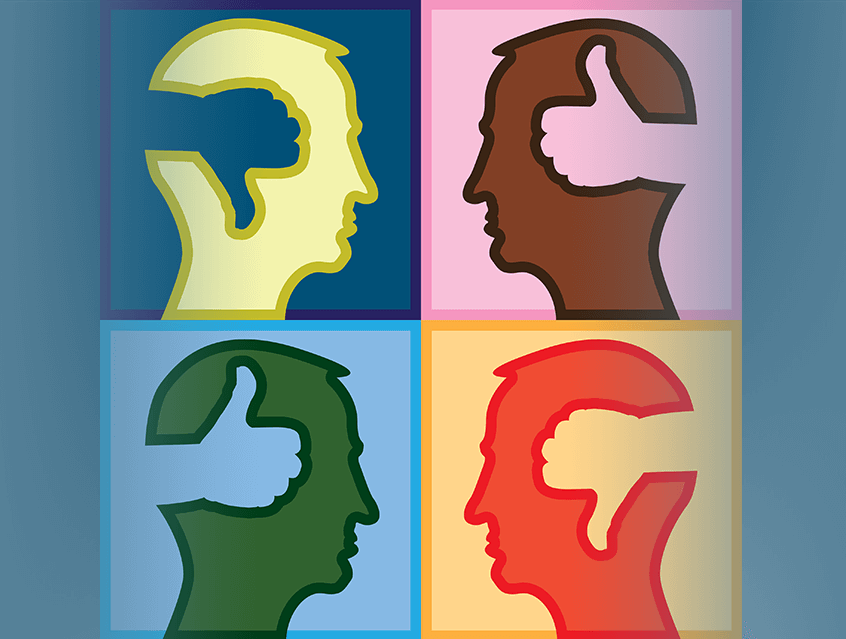 Four heads with thumbs up and down cut out