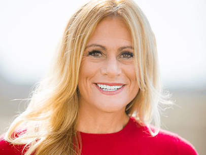 Woman in red shirt smiling