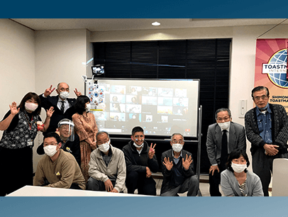 Group of people in masks posing
