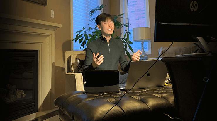 Man speaking in front of camera