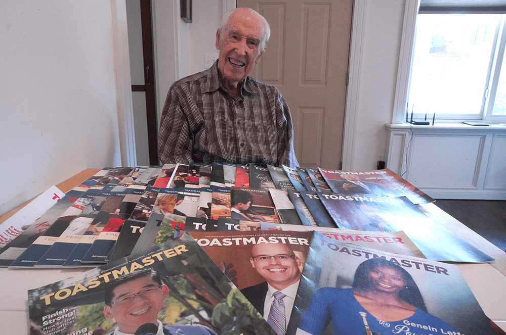 Oren Lee Peters of Edmond, Oklahoma, shows off his collection of Toastmaster magazines.