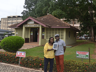 Ronda Hetterson and Charles Pumpuni, both of Springfield, Virginia, visit the Komfo Anokye Sword Site in Kumasi, Ghana. Legend states that the sword has been wedged in stone for more than 300 years and cannot be moved—a symbol of the unity and strength of the Ashanti people.