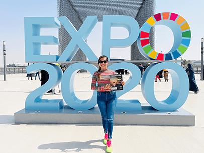 Neev Condes of Ajman, United Arab Emirates, poses at Expo 2020 in Dubai—a six-month event with pavilions representing 192 countries. Condes visited all 192 pavilions!