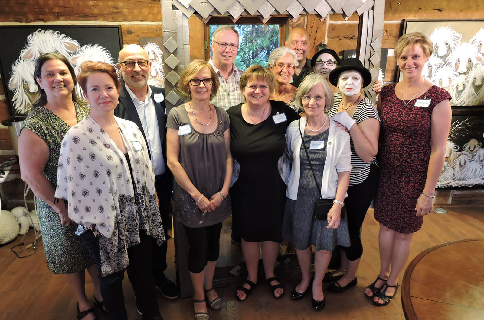 Members of 91传媒 des Laurentides club in Quebec, Canada, host an open house in the Art Gallery B茅liveau for their 15th anniversary.
