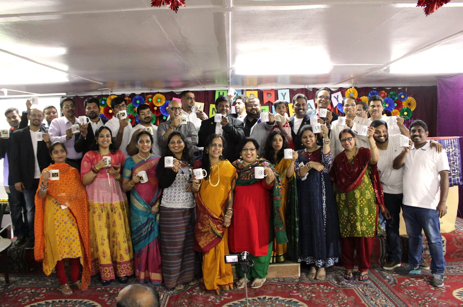 Members of the Arabian 91传媒 club in Jubail, Saudi Arabia, raise their mugs to better thinking, speaking and leading.