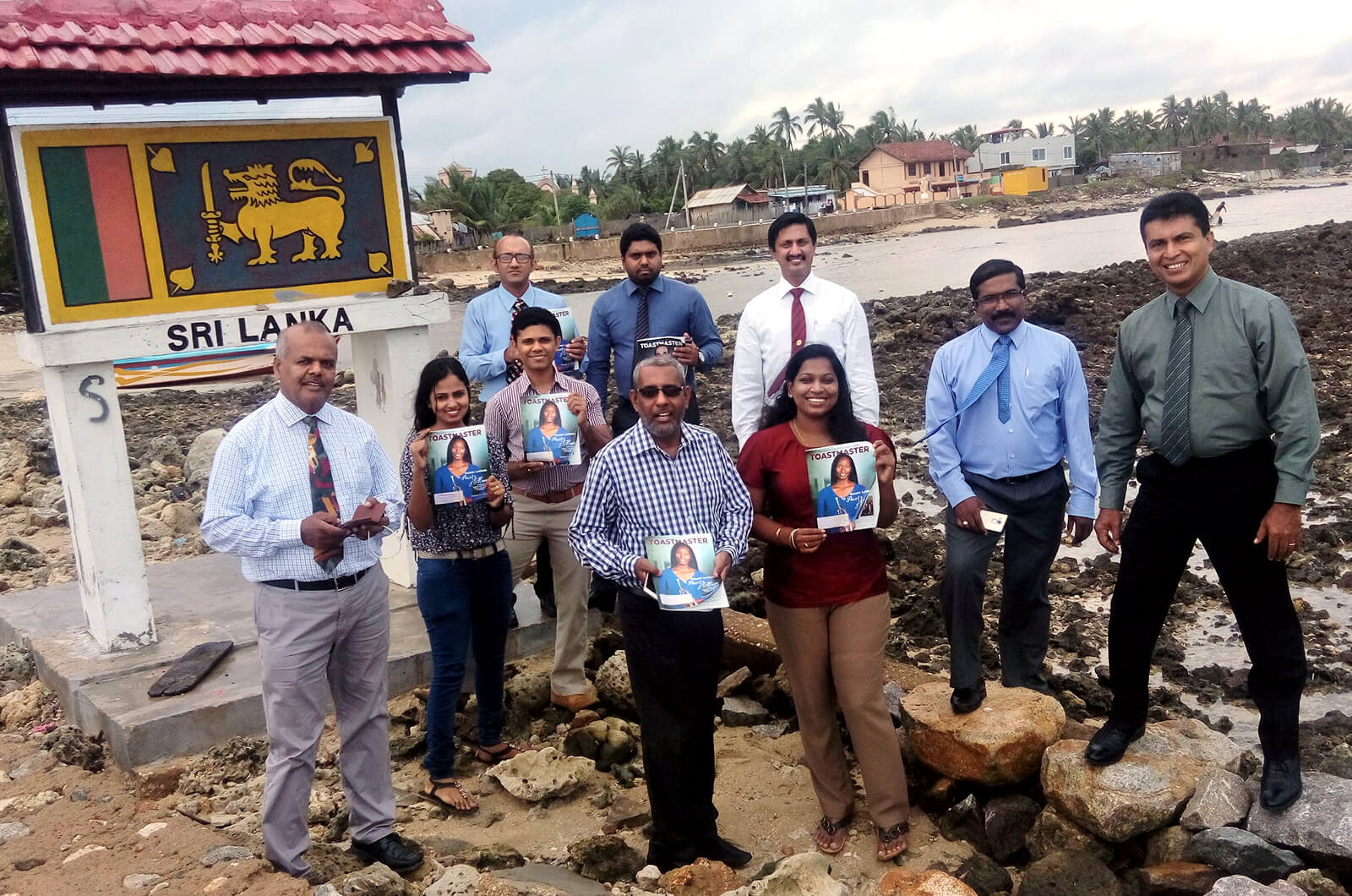 BCIS Toastmasters members pose for a photo at the top of Sakkottai Cape in Point Pedro, Sri Lanka.