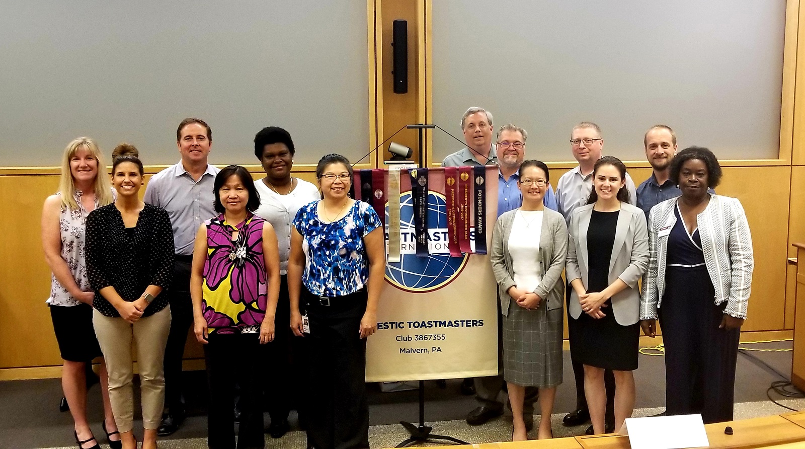 The diverse members of the Majestic 91传媒 club in Malvern, Pennsylvania, pose proudly with their club banner.